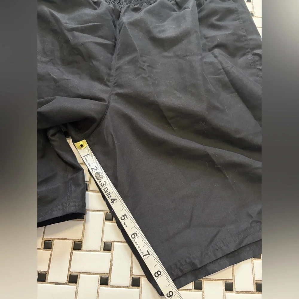 Nike Black Men's Mesh Athletic Shorts with White Swoosh